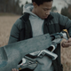 A boy, a gun.